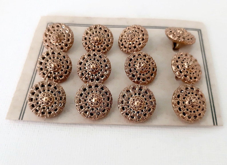 Filigree gilt mirror backs metal Austrian twinkles card of 12 mint condition 13 mm half inch