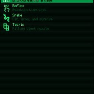 May include: A digital screen interface displaying a list of games in bright green text on a dark background. The menu includes Breakout, Reflex, Snake, and Tetris, each with a corresponding icon and a short descriptive subtitle for each game title.