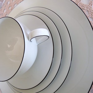 KPM Berlin Germany - Choice: 5pc or 4pc Dinner Place Setting in the URBINO CANTO pattern No. 12 - smooth Black Trim designed by Enzo Mari
