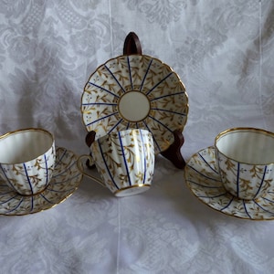 Royal Chelsea - 763A - Lot THREE - Coffee / Tea Cup and Saucer Sets with Blue & Gold Stripes w/ Gold Leaves PLUS 1 Free additional Cup