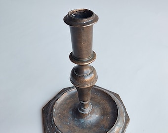 Antique bronze candlestick, from Spain or France, ca 1700, with an elegant balluster shaped stem