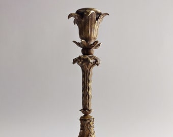 A delightful late XIX-century French bronze Art Nouveau candlestick with beautifully detailed lizards and a snail