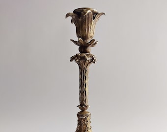 A delightful late XIX-century French bronze Art Nouveau candlestick with beautifully detailed lizards and a snail