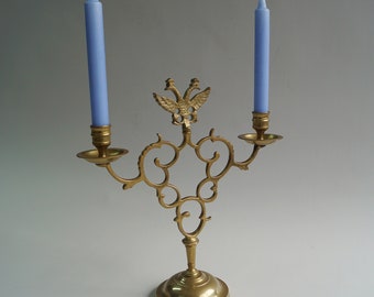 Central European bronze candelabra with two arms and crowned with double-headed eagle