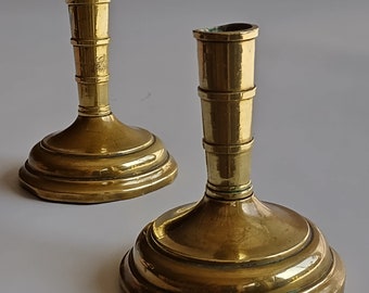A pair of charming lead-weighted small candlesticks, 18th/ early 19th century
