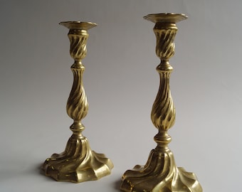 Amazing and rare pair of heavily executed twisted bronze candlesticks, 18th century German