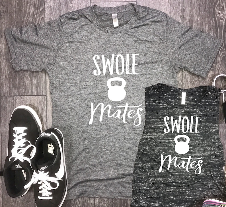 May include: Two gray and black shirts with the text "Swole Mates" and a white dumbbell icon.