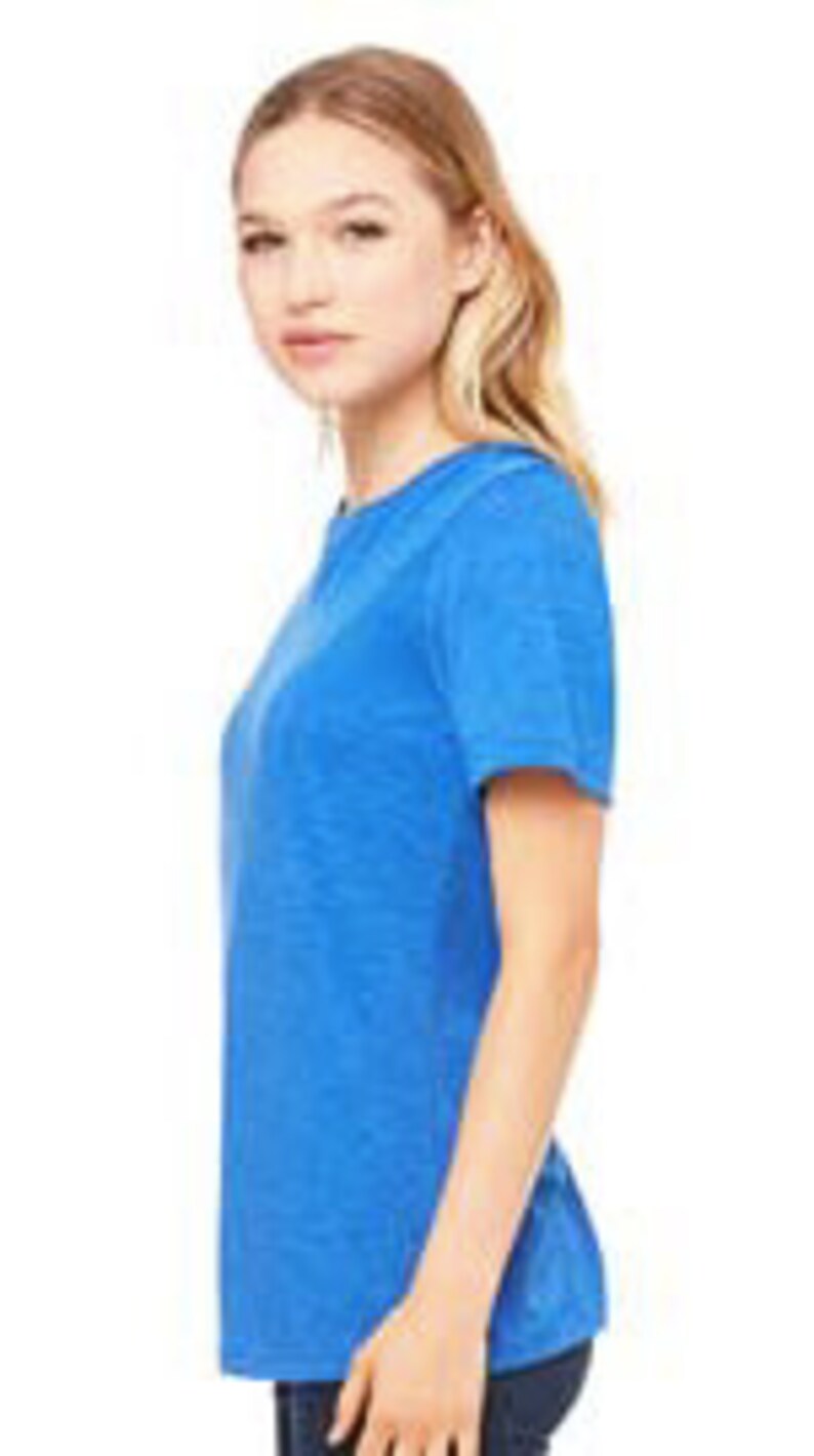 May include: A light blue short-sleeved t-shirt with a relaxed fit.