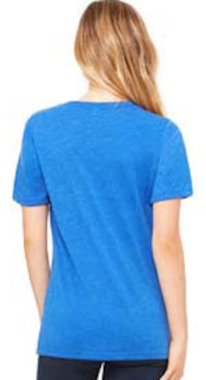 May include: A royal blue short-sleeved t-shirt with a relaxed fit.