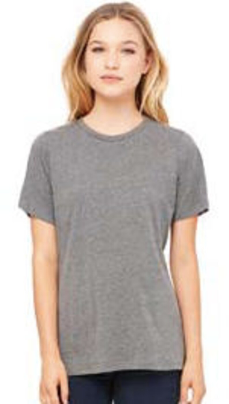 May include: A heather gray short-sleeved t-shirt with a crew neck.