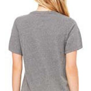 May include: A heather gray short-sleeved t-shirt with a relaxed fit.
