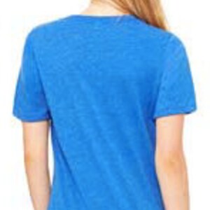 May include: A royal blue short-sleeved t-shirt with a relaxed fit.