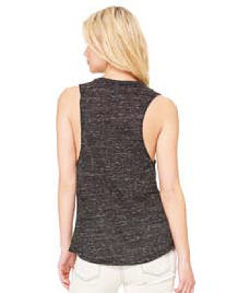 May include: A black and gray sleeveless shirt with a relaxed fit. The shirt is made of a soft, comfortable fabric and has a slightly distressed look.