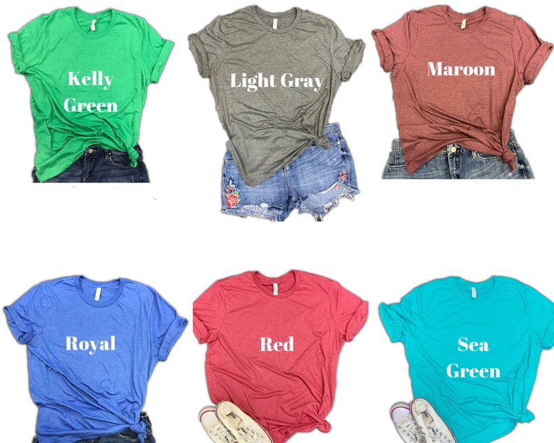 May include: Six different colored t-shirts with various text printed on them. The colors are Kelly Green, Light Gray, Maroon, Royal, Red, and Sea Green. The text on the shirts reads "Kelly Green", "Light Gray", "Maroon", "Royal", "Red", and "Sea Green".