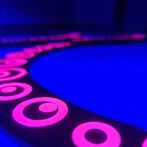 Buugeng neon circles .flow toy.round edges. By snakejuggling.com