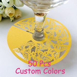 May include: Yellow paper wine glass charms with a butterfly design. 50 Pcs Custom Colors.