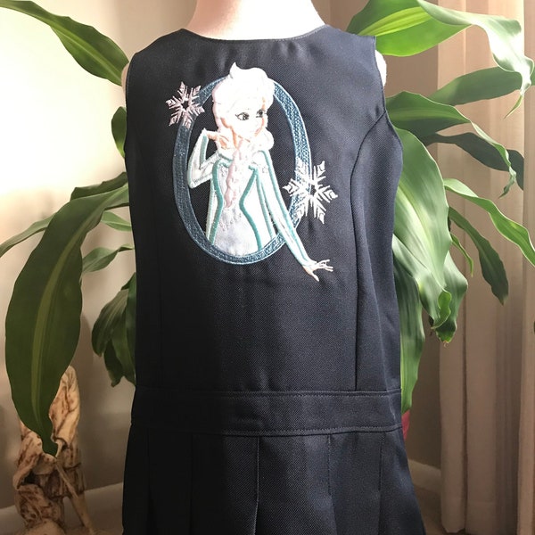 Size 3T Navy blue jumper/dress with 3 1/2 inch pleated skirt. I added an embroidery 'Ice Princess' design. Embroidery is soft lined.