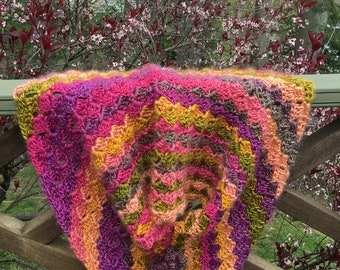 Hand crocheted boho shawl/poncho in Coral Reef