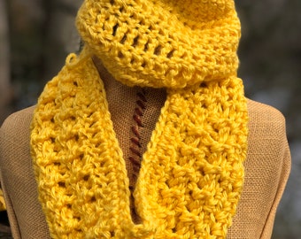 Hand crocheted infinity scarf and skull cap with pompom in buttercup yellow