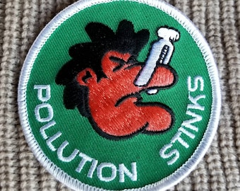 Vintage 70s Pollution Stinks Embroidered Iron On Patch 3&quot;