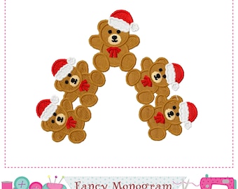 May include: Embroidered brown teddy bears wearing red Santa hats and bows. The bears are arranged in a circular pattern. The image has a white background and a pink dotted border. The text "Fancy Monogram" is at the bottom.