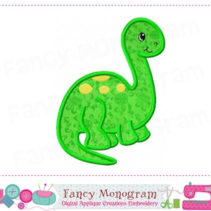 May include: Green dinosaur applique embroidery design with yellow spots. This design is perfect for adding a fun and whimsical touch to your projects.