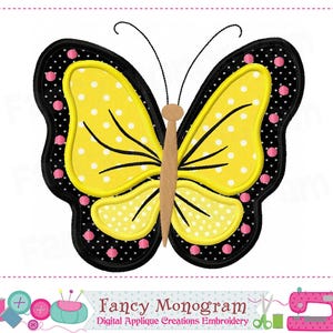 May include: A yellow butterfly with black outlines and pink accents. The butterfly has white polka dots on its wings.
