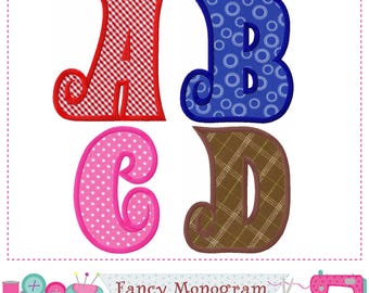 May include: Four embroidered letters: A, B, C, and D. The letter A is red gingham, B is blue with white circles, C is pink polka dots, and D is brown plaid. The letters are outlined in coordinating colours. The image includes the text "Fancy Monogram".