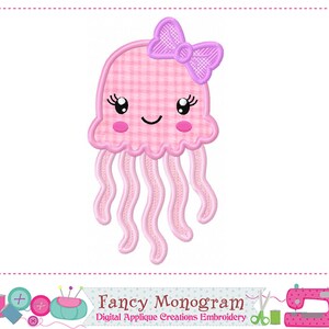 May include: An embroidery design featuring a light pink jellyfish with a white gingham pattern on its bell. The jellyfish has a purple bow on top, black eyes with white highlights, pink cheeks, a curved smile, and six wavy pink tentacles.