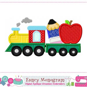 May include: A colorful embroidered train design with a yellow engine, red and blue passenger cars, and green wheels. The train carries a pencil, a book, and a red apple, perfect for back-to-school projects.