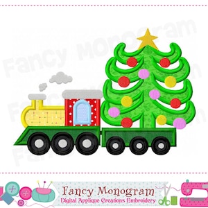 May include: A colorful embroidery design of a Christmas train. The train is yellow and red, with a green Christmas tree on the back car. The tree is decorated with red, yellow, and pink ornaments and a gold star. The text "Fancy Monogram" is at the bottom.