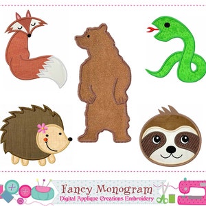 May include: Five embroidered animal applique designs: a brown bear, a red fox, a green snake, a brown hedgehog with a pink flower, and a brown sloth. The designs are on a white background and are perfect for adding a touch of whimsy to any project.