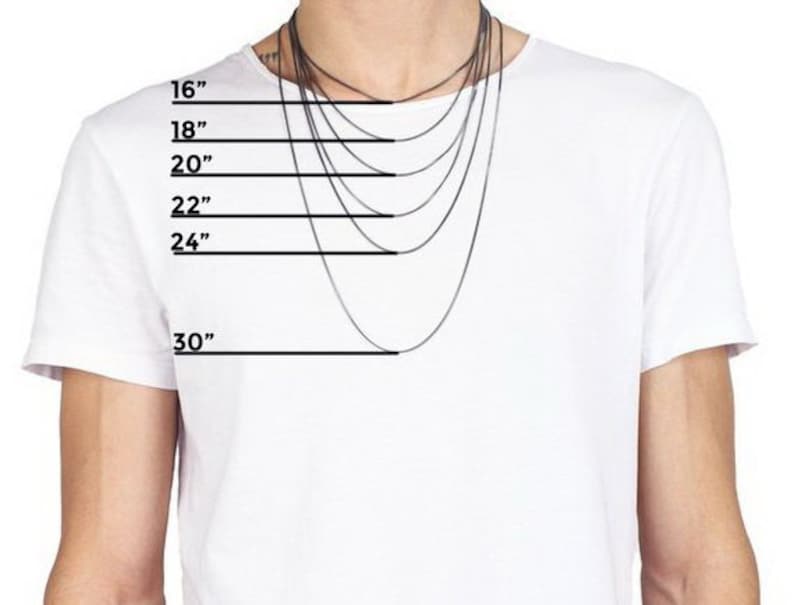 May include: A white t-shirt with a model wearing a variety of silver chains, with measurements in inches from 16 to 30 inches.