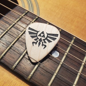 Hylian Crest Zelda Guitar Pick in  maple