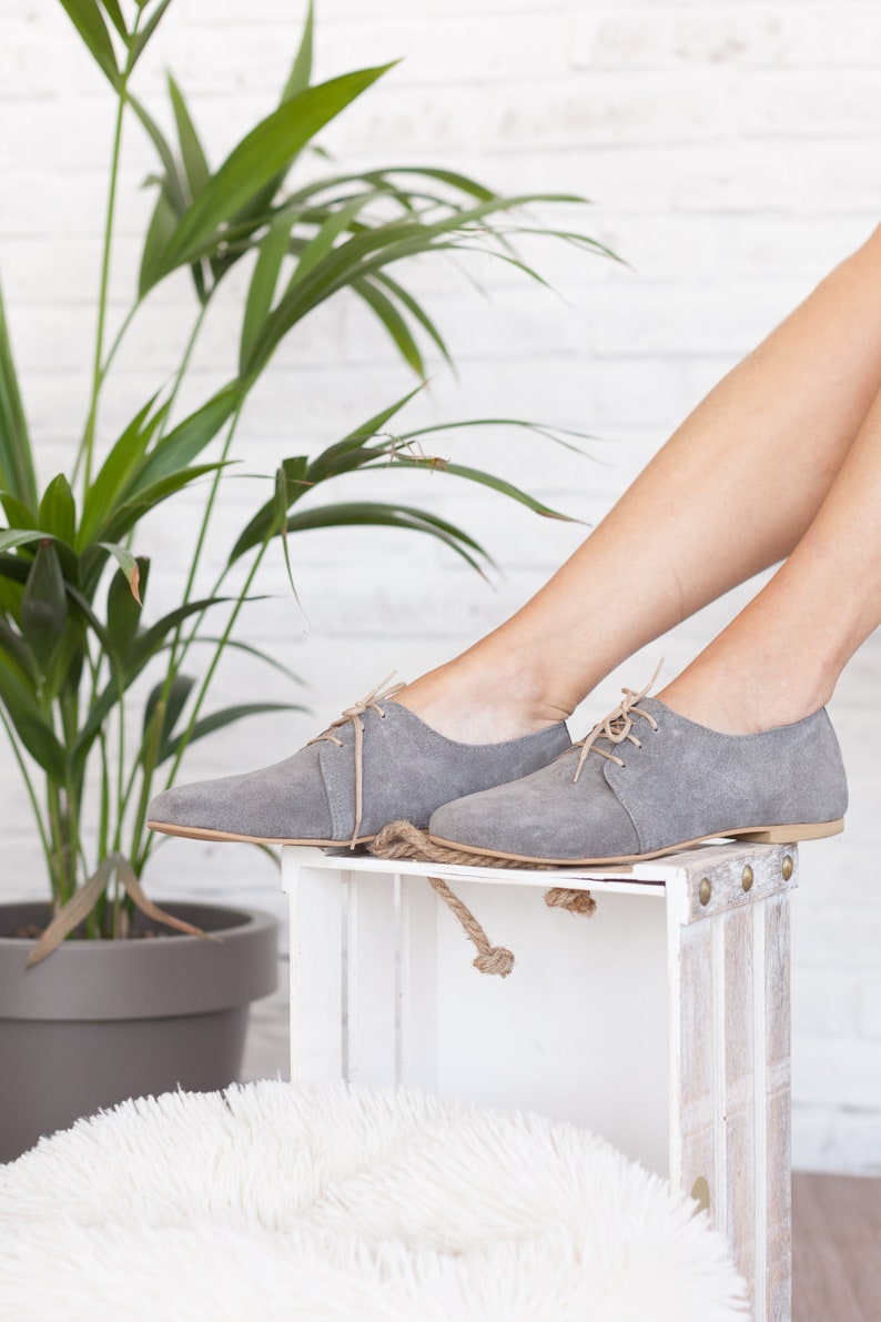 gray suede pointed toe flats