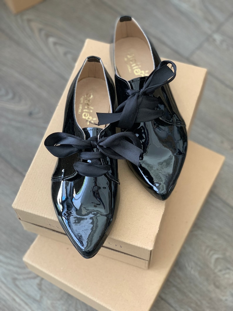 shiny black flats