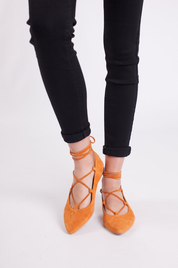 pointed toe tie up flats