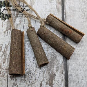 4pk rolled cinnamon bark hanging decoration.