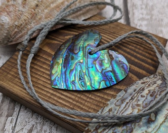 New Zealand rainbow paua abalone shell heart shaped unisex pendant.