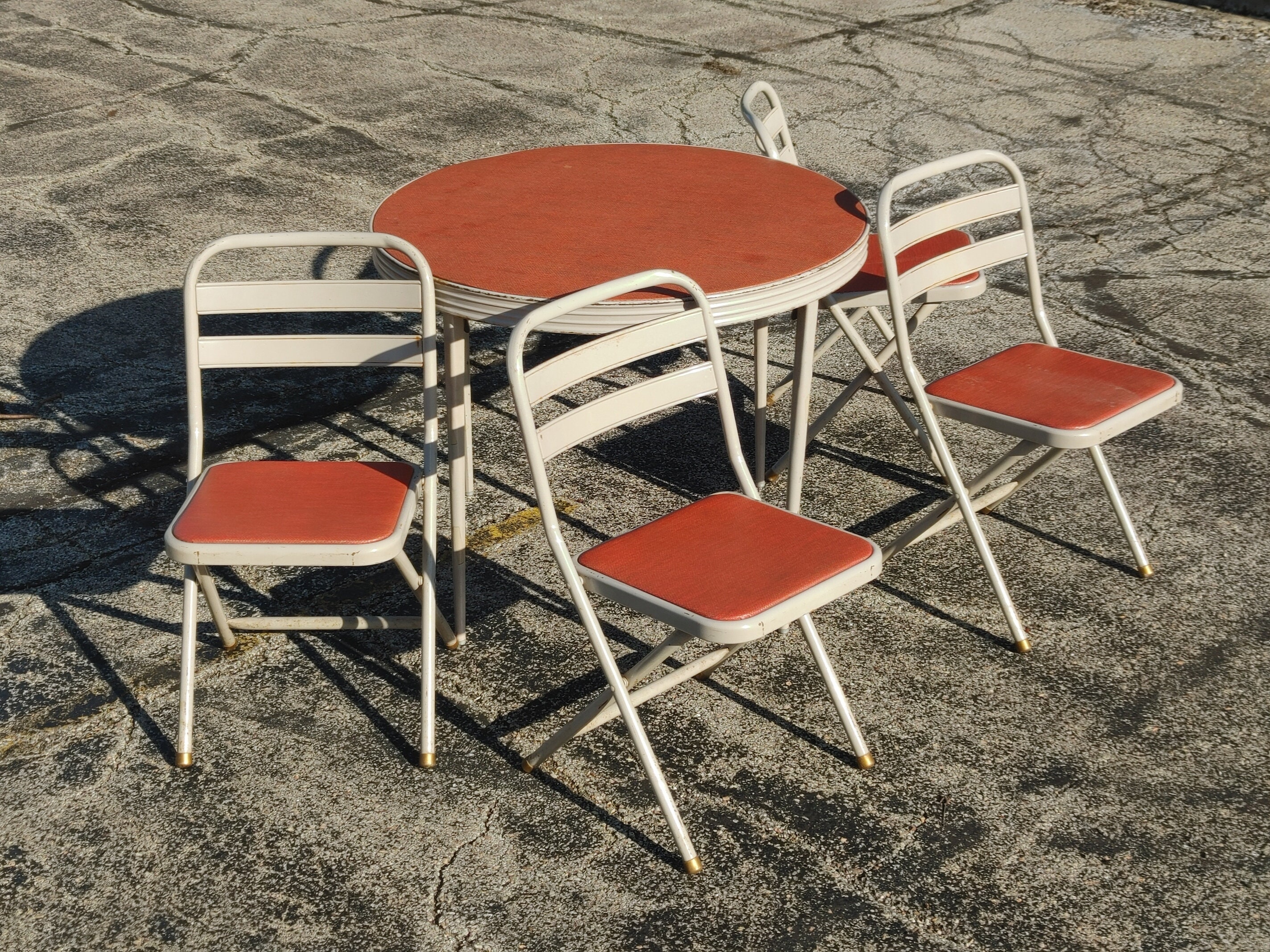 Metal folding sale table and chairs