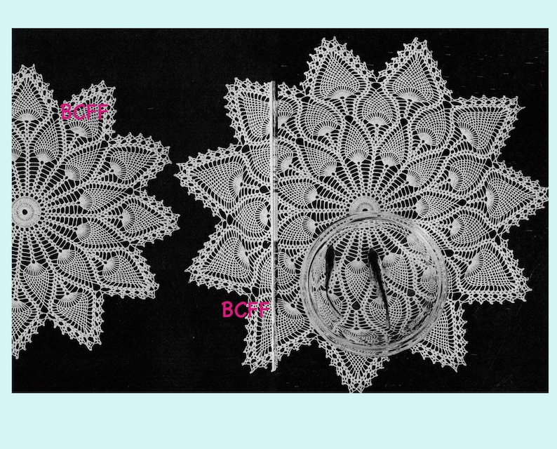 May include: Two white crocheted doilies with a starburst design. The doilies are on a black background.