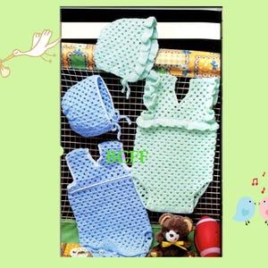 May include: A collection of handmade baby clothes, including two bonnets and two rompers in light blue and mint green. The crochet outfits are displayed with a small teddy bear and a red football. The background is a light green.
