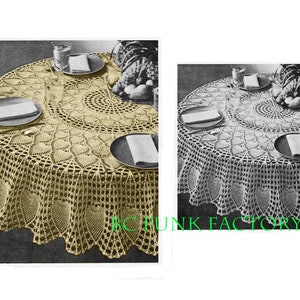 May include: A crocheted table cloth with a scalloped edge and a delicate floral pattern. The tablecloth is beige and is laid on a table with a glass of liquid and plates.