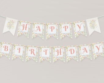 May include: A white banner with a floral pattern and pink letters spelling "Happy Birthday".