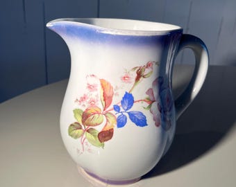 Arabia, Finland, milk pitcher, lustre-ware, marked "Arabia, Suomi, Finlandia," "pipe" back stamp c. 1923-1949. Excellent condition.