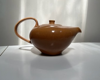 Russel Wright (1904-76) Casual China Teapot for Iroquois USA, c. 1950. In "Ripe Apricot." Excellent condition.