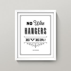 May include: Black and white framed print with the text "NO Wire HANGERS EVER!" - Joan Crawford.