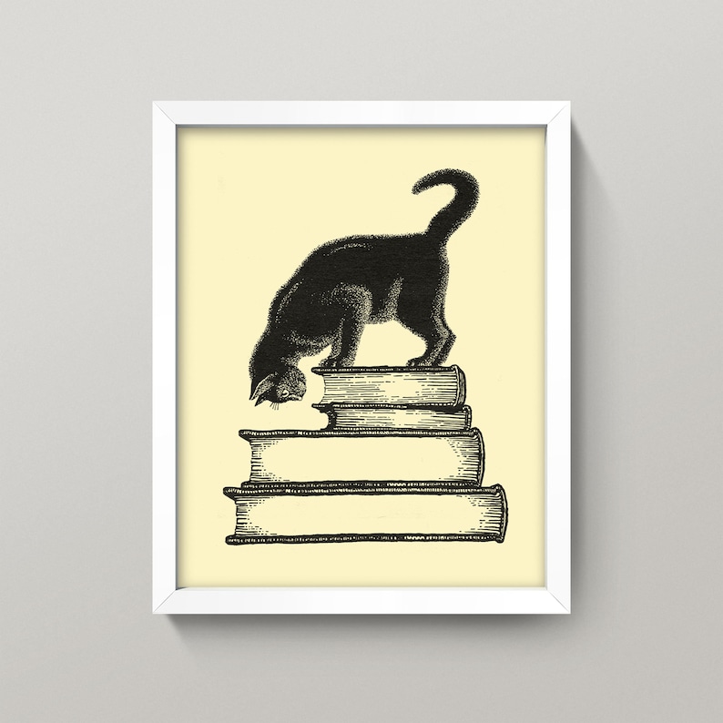 May include: Black cat illustration on a stack of books, set in a white frame. The cat is depicted in a vintage style, with its head down, as if it's investigating something. The background is a soft yellow.