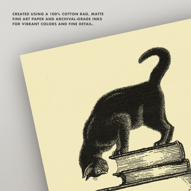 May include: Black cat illustration on a stack of books. The cat is arched over the books, with its head down. The image is printed on matte fine art paper with archival-grade inks. The text at the top says "CREATED USING A 100% COTTON RAG, MATTE FINE ART PAPER AND ARCHIVAL-GRADE INKS FOR VIBRANT COLORS AND FINE DETAIL."