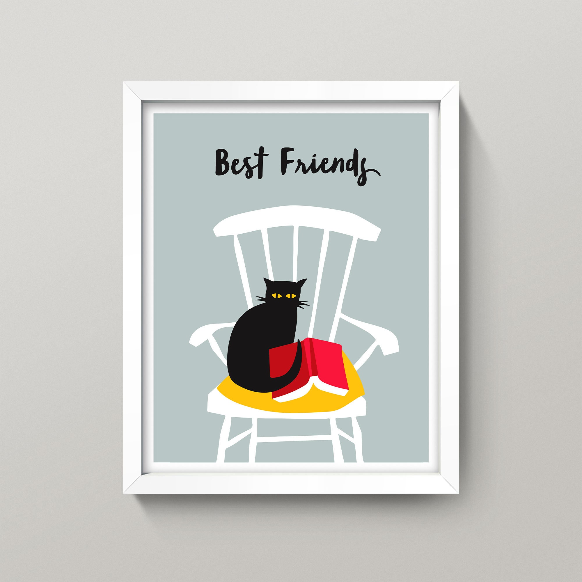 Wall art depicting a cat and a book- symbolizing companionship